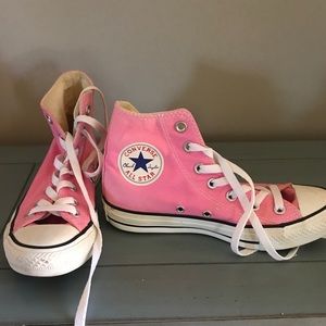 Women’s pink high top converses